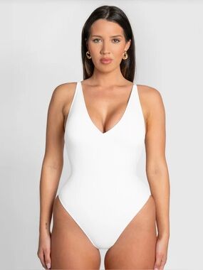 $178 MSRP XS HIGH CUT PLUNGEY CHEEKY NWT